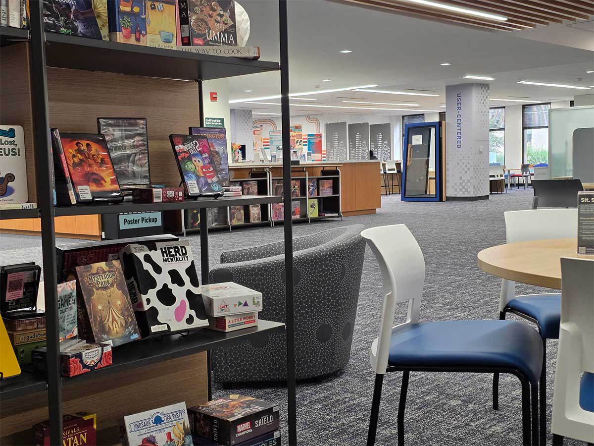 Book display with tables and chairs.