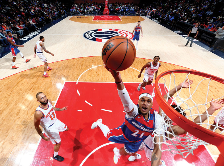 Washington Wizards center Daniel Gafford drives to the rim for a layup