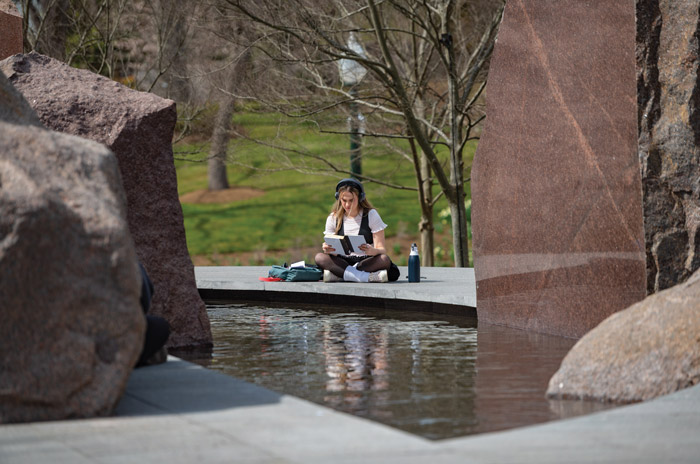 student reading near Sudama