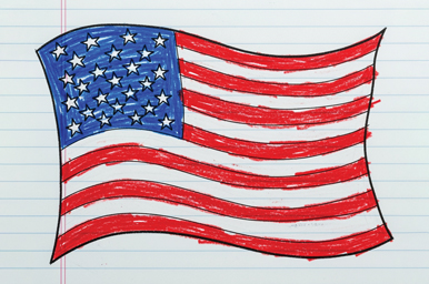 a hand-drawn US flag on a piece of notebook paper