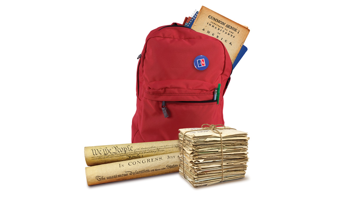 red backpack with parchment paper documents