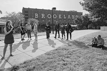 AU alumni stand near the Brookland Metro station