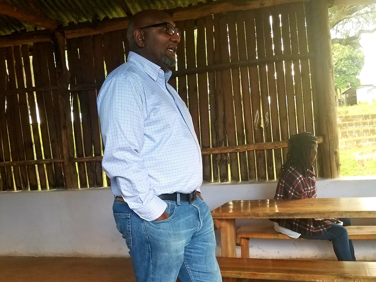 AU Nairobi director Mwangi Njagi gives a lecture to students in Nairobi.