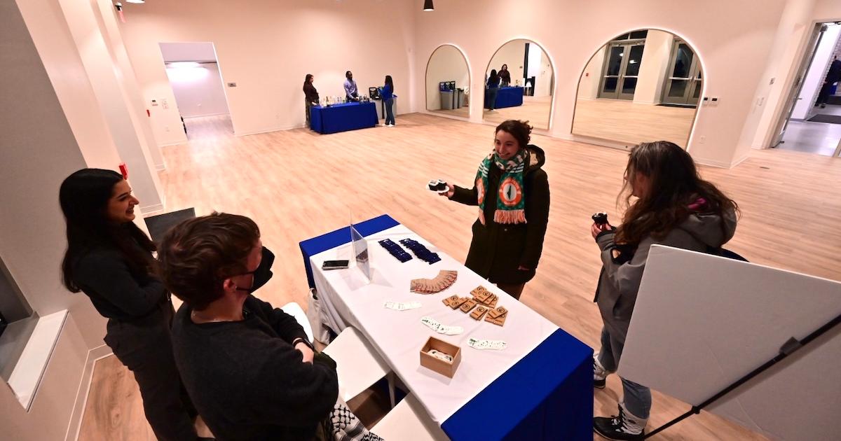 Sustainability table at the Meltzer Center. Photo by Jeff Watts.
