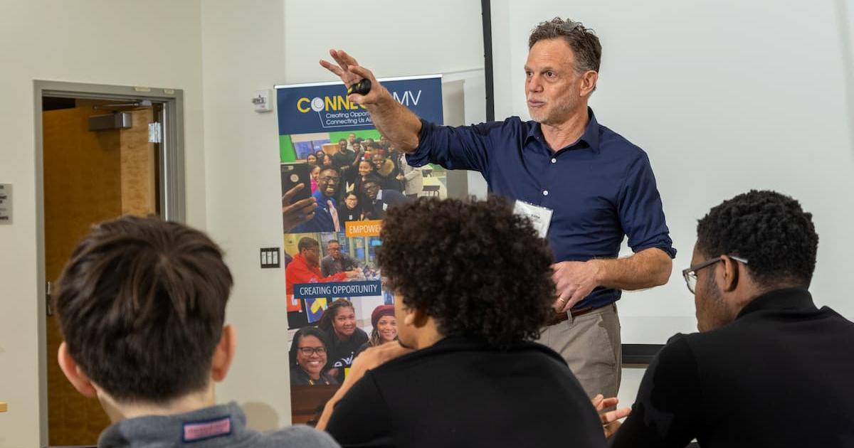 Tom Kohn speaks at a CONNECTdmv event. Photo courtesy of Tom Kohn. 