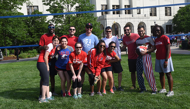Members of AU's Office of Campus Life pose on the quad before the annual staff appreciation volleyball tournament.