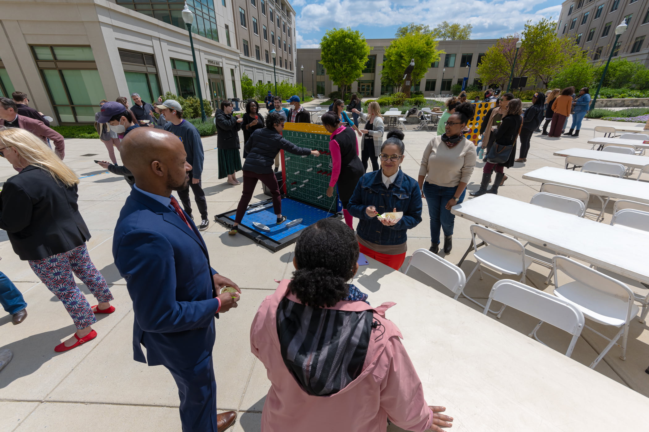 Staff playing games on East Campus quad