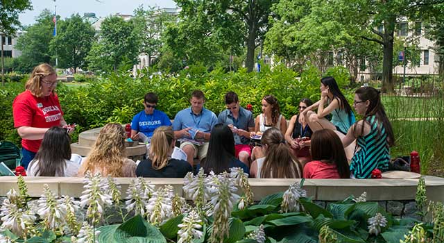 Students enjoying the Quad in Spring