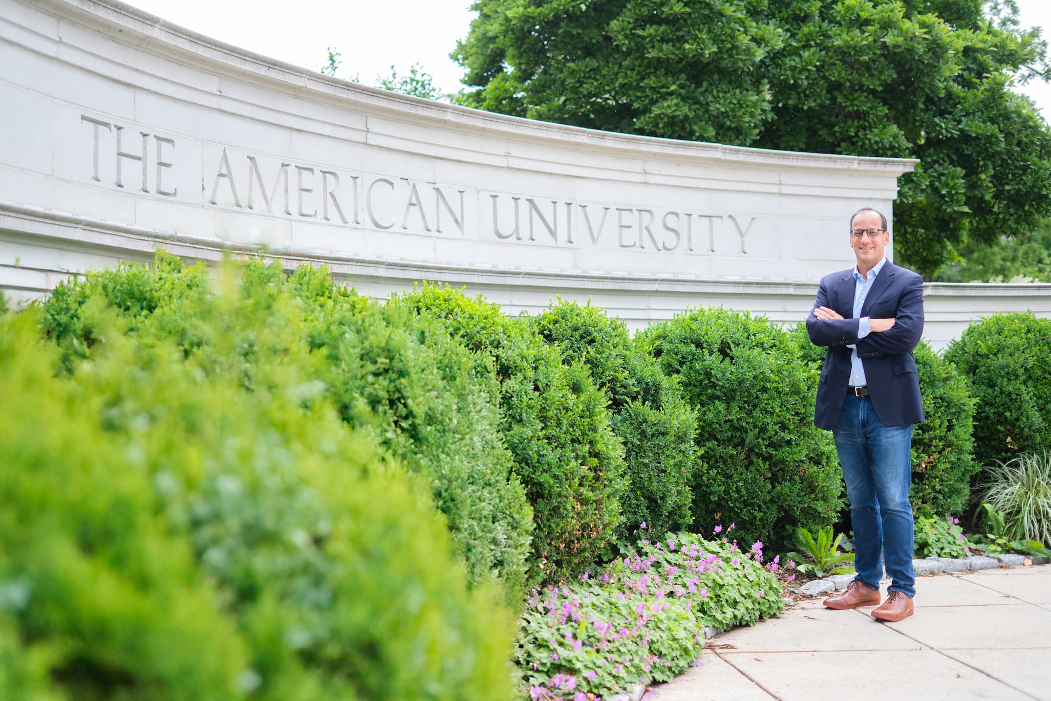 Marchick at AU sign Marchick standing in front of the AU sign