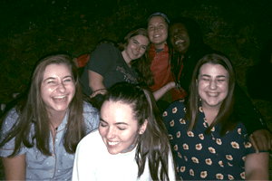 McKenzie laughing with friends