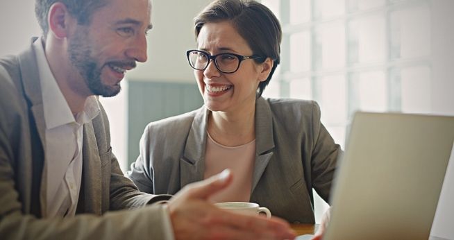 An executive coaching session with two participants