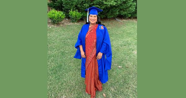 Adrika Lazarus in graduation cap and gown