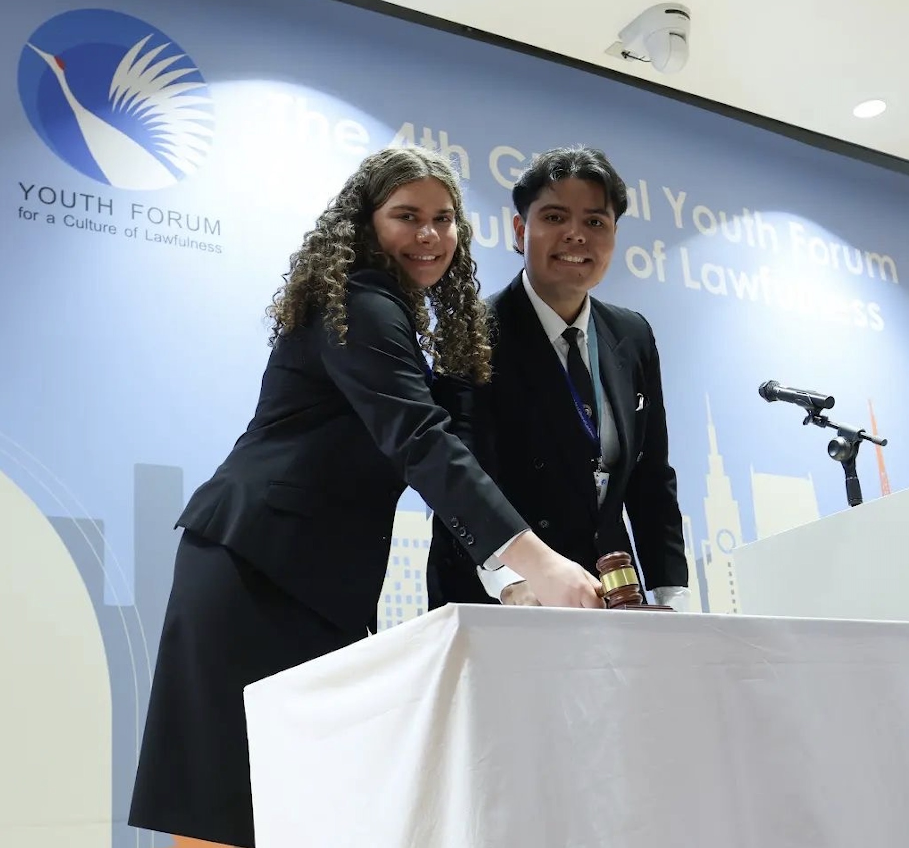 Coralie Arias and a co-presenter at the Youth Forum for a Culture of Lawfulness