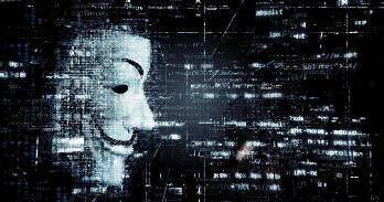 An Anonymous Guy Fawkes mask made of computer code.