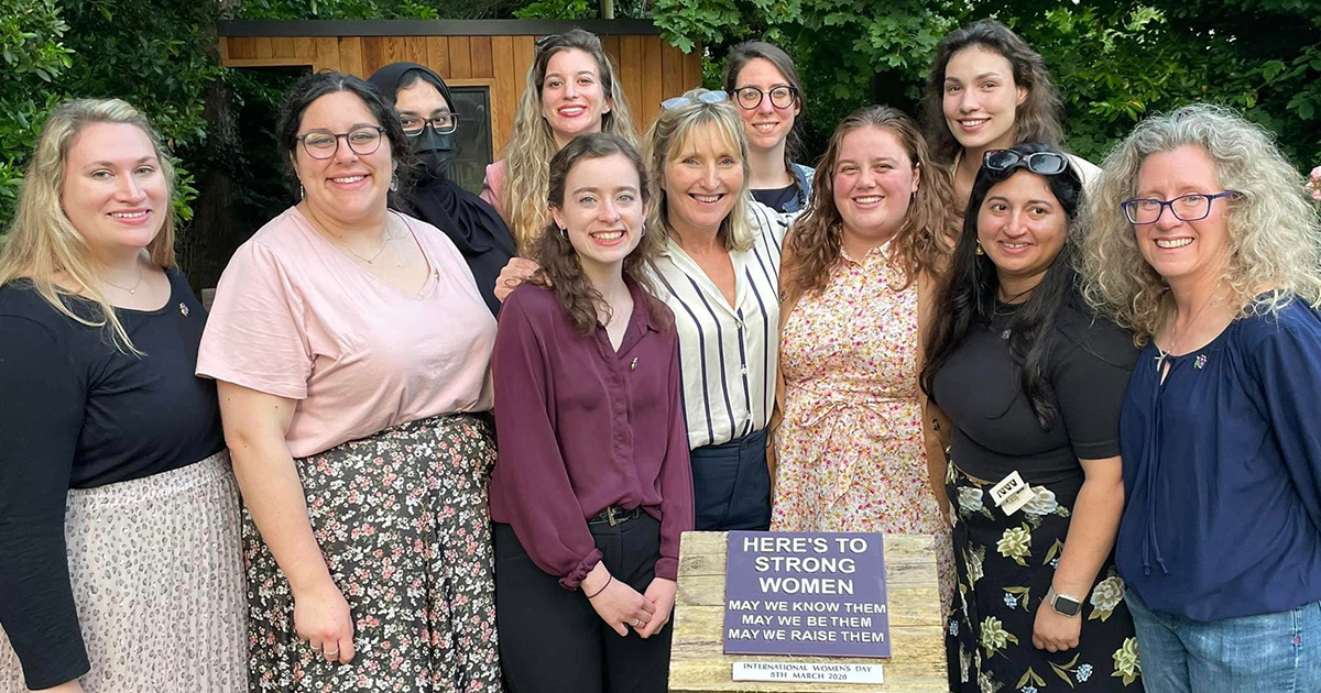 SIS professor Carolyn Gallaher with a group of students