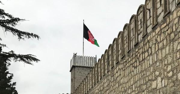 A national flag of Afghanistan on a building in Kabul.