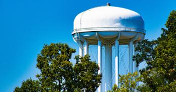 A large white municipal water tower