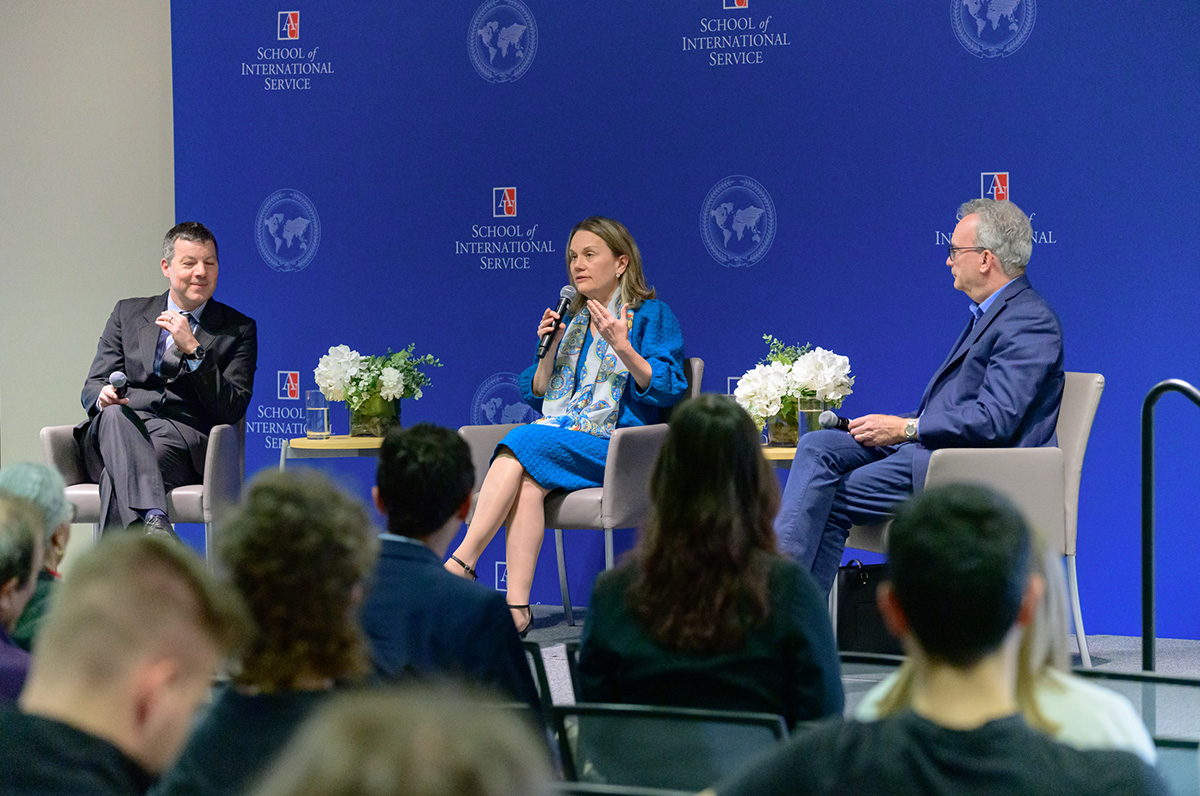 Former US ambassador to NATO Julianne Smith speaks into a microphone during a panel discussion.