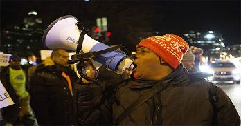 Shelia White holding a megaphone.