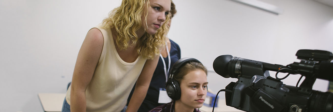Students working on a camera