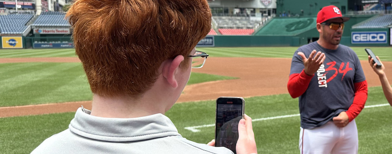dwc student films on phone