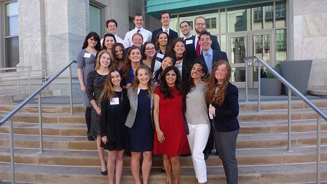 Spring 2016 PR Portfolio class stands in front of the McKinley Building