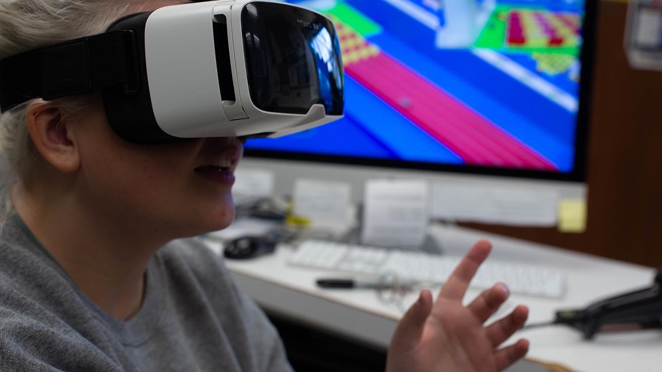 Woman wearing virtual reality headset