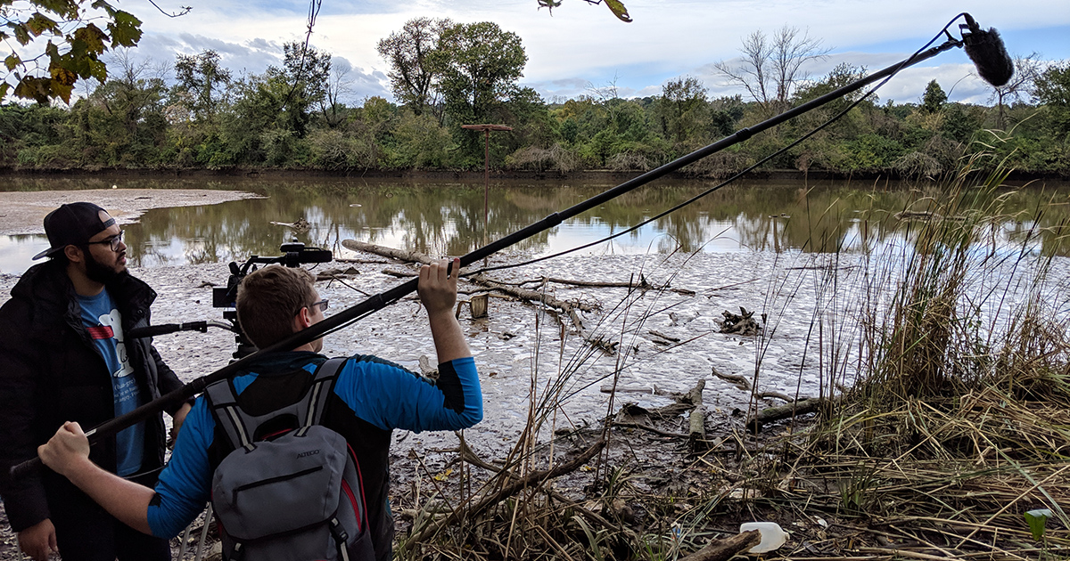 Students filming on the Anacostia River