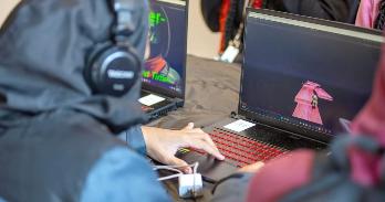 Game Student attends AMYF