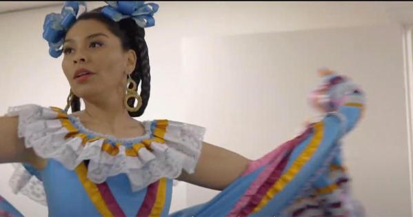 Woman wearing traditional Mexican folk dance attire