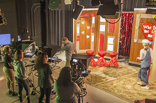 Studio Television Production students prepare to shoot an episode of Why Don't You Love Me on set