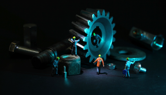 Gears and toys arranged to illustrate engineering