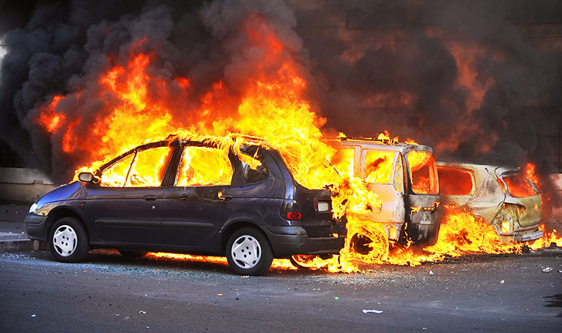 Parked cars burning