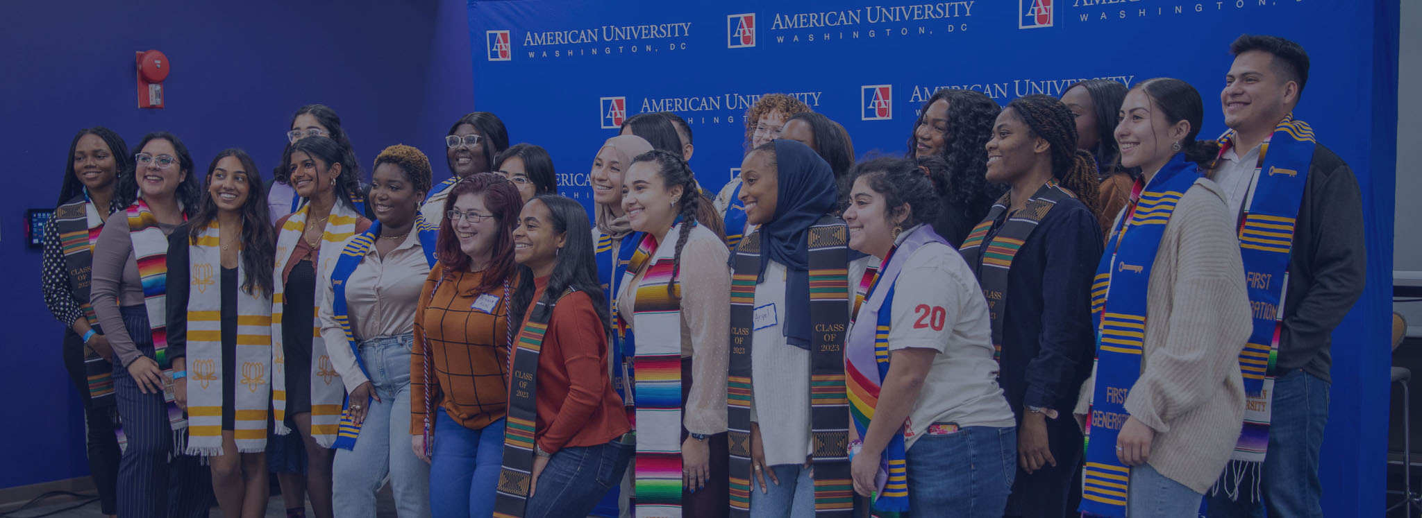 A group of students pose at AU's winter affinity graduation.