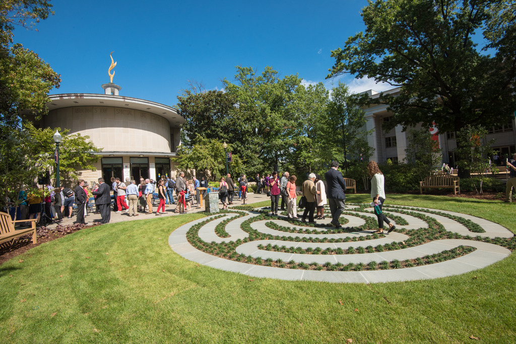 People walk the labyrinth at its dedication