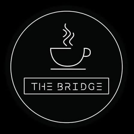 Bridge Cafe Logo_round Ouline of a cup of coffee above the words The Bridge,
