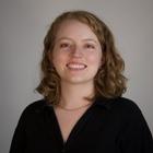 Professional headshot photo of Casey