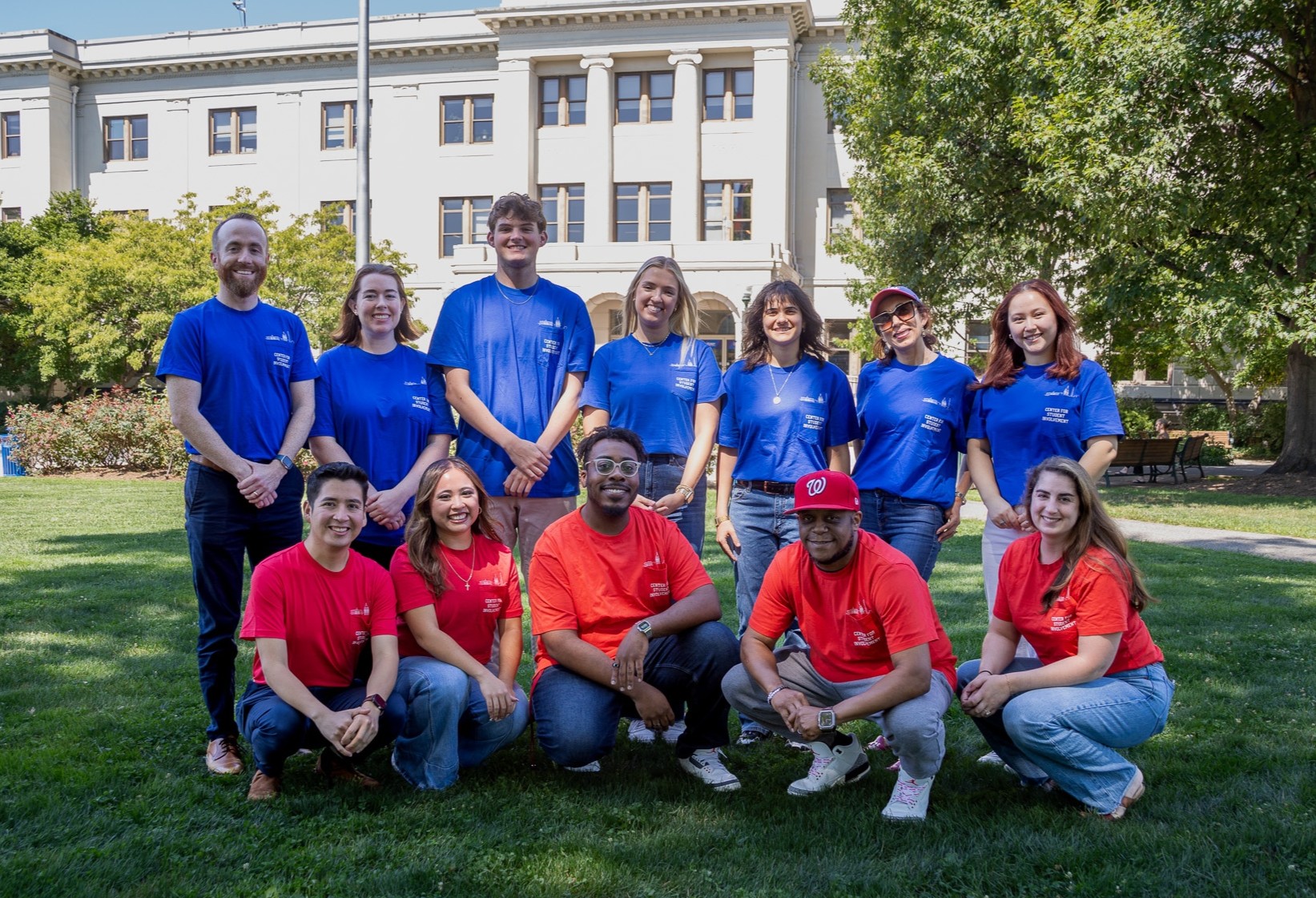 Staff members at the Center for Student Involvement gathered on the stairs of Mary Graydon Center.