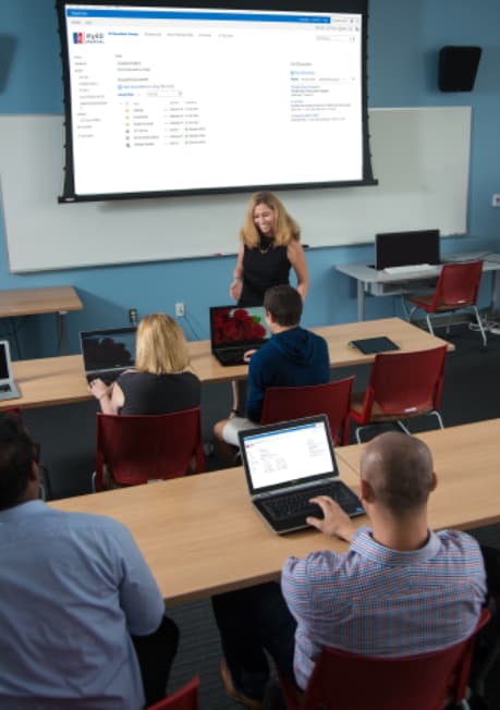 instructor in front of students in classroom