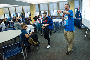 professor harry talks to students