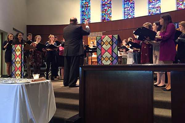 Professor Dan Abraham leads the AU Chamber Singers in singing Bach's Professor Dan Abraham leads the AU Chamber Singers in singing Bach's