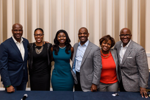 Genever Oppong (center) with ELC coca-cola executives.