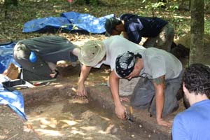 AU students excavating a probable eighteenth or nineteenth century maroon cabin footprint