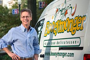 Photo of Ron Vogel next to Booeymonger van.