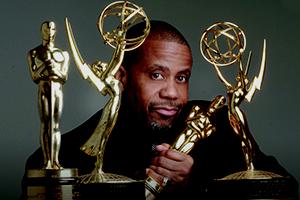 AU's Russell Williams with his Oscars and Emmys.