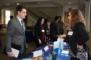 Student talking to employer