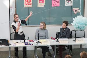 Three women speaking on a panel