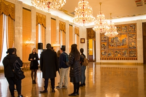 AU Gap Students participate in a private tour of the Russian Embassy in an opulent ballroom.