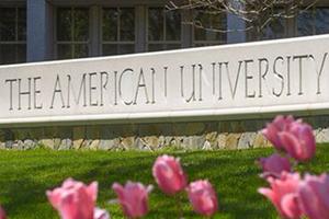 The AU welcome sign and pink flowers