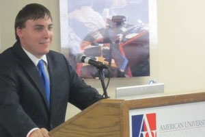 Elliot Bell-Krasner, SPA/MPP '12, addresses the crowd at an AU event. 